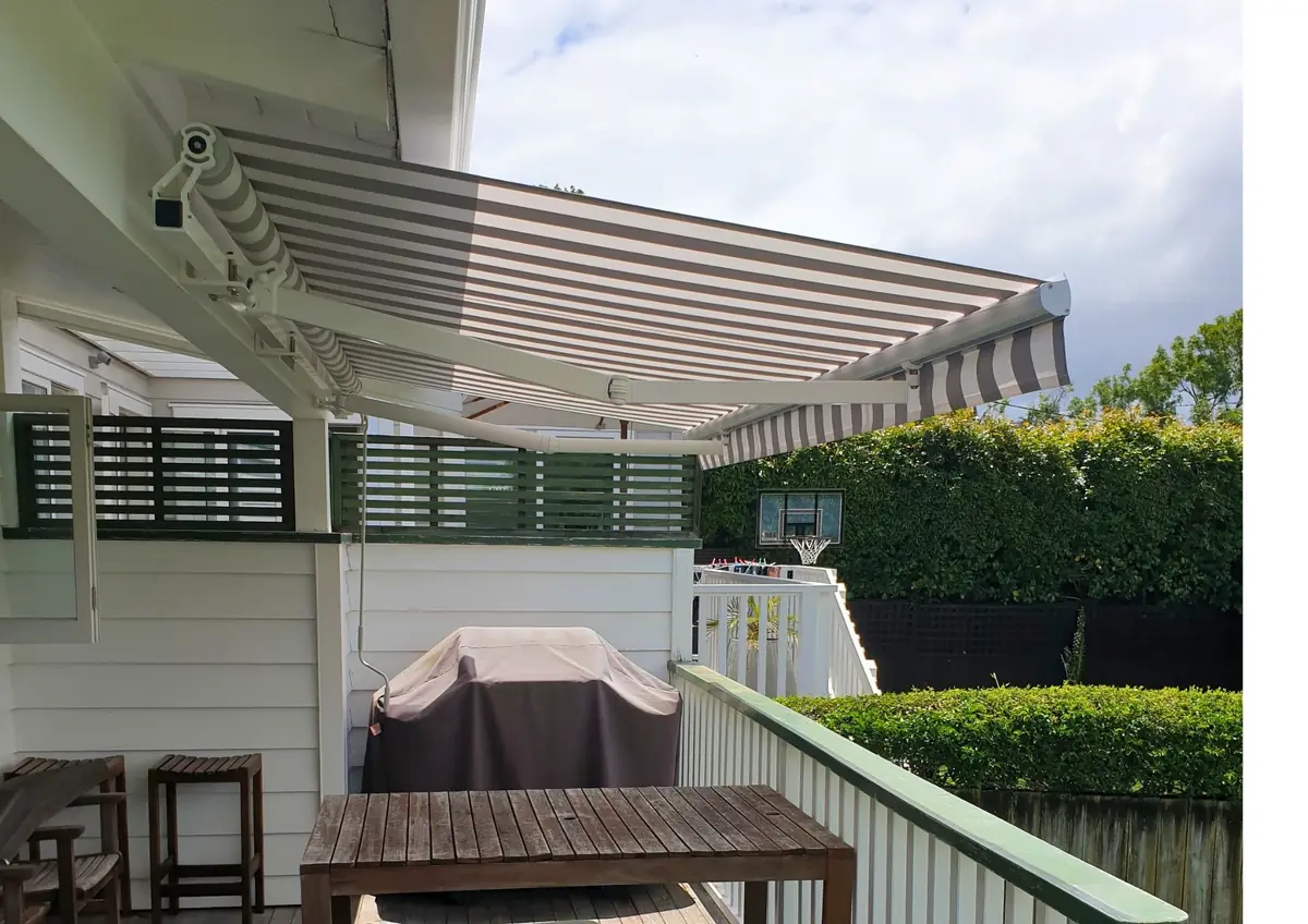 Striped Ellipse retractable awning