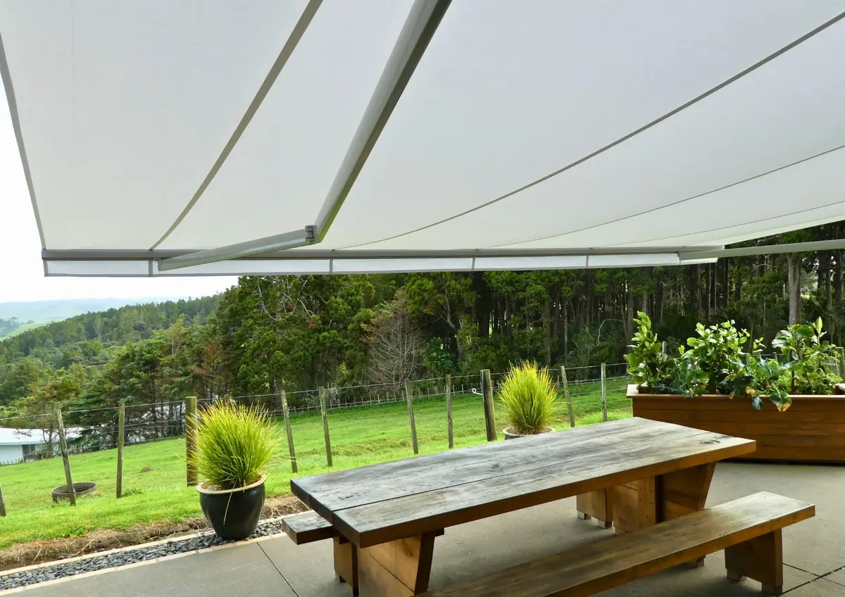 White Ellipse folding arm awning