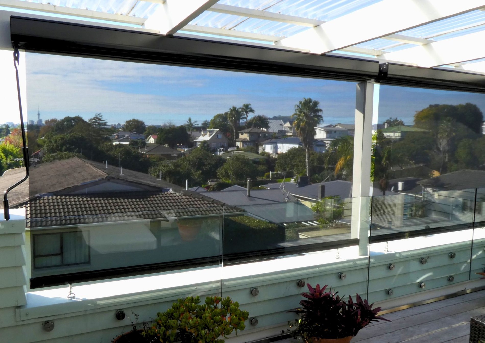 Outdoor mesh screens overlooking Auckland